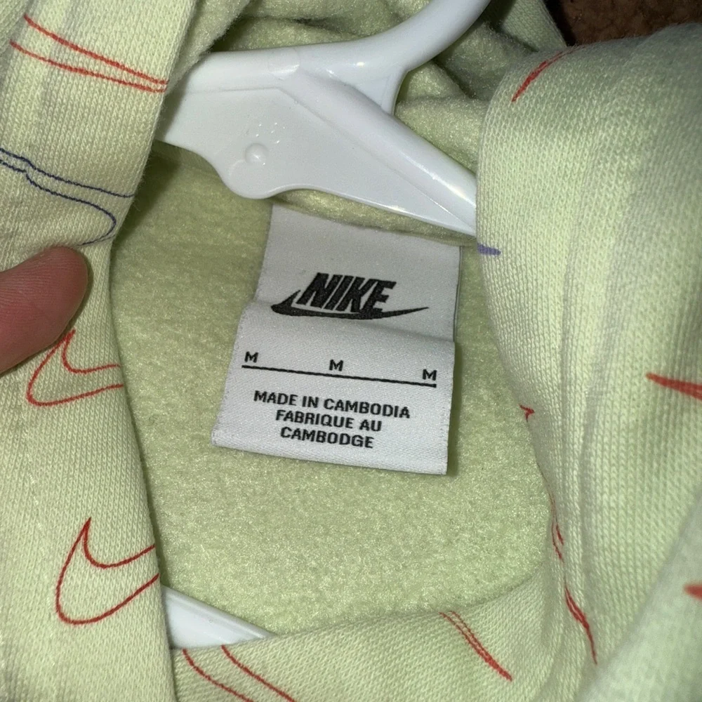 2/$15 Nike Green Hoodie with Multicolor Swoosh Pattern, minor stains